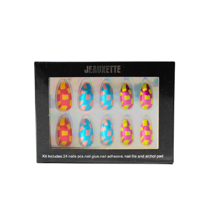 Box of colorful nail art check print press-on nails with Jeauxette branding on a white background