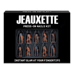 Jeauxette press-on nails kit packaging with tortoiseshell design on a white background