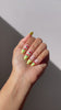 Close-up of cherry design press-on nails