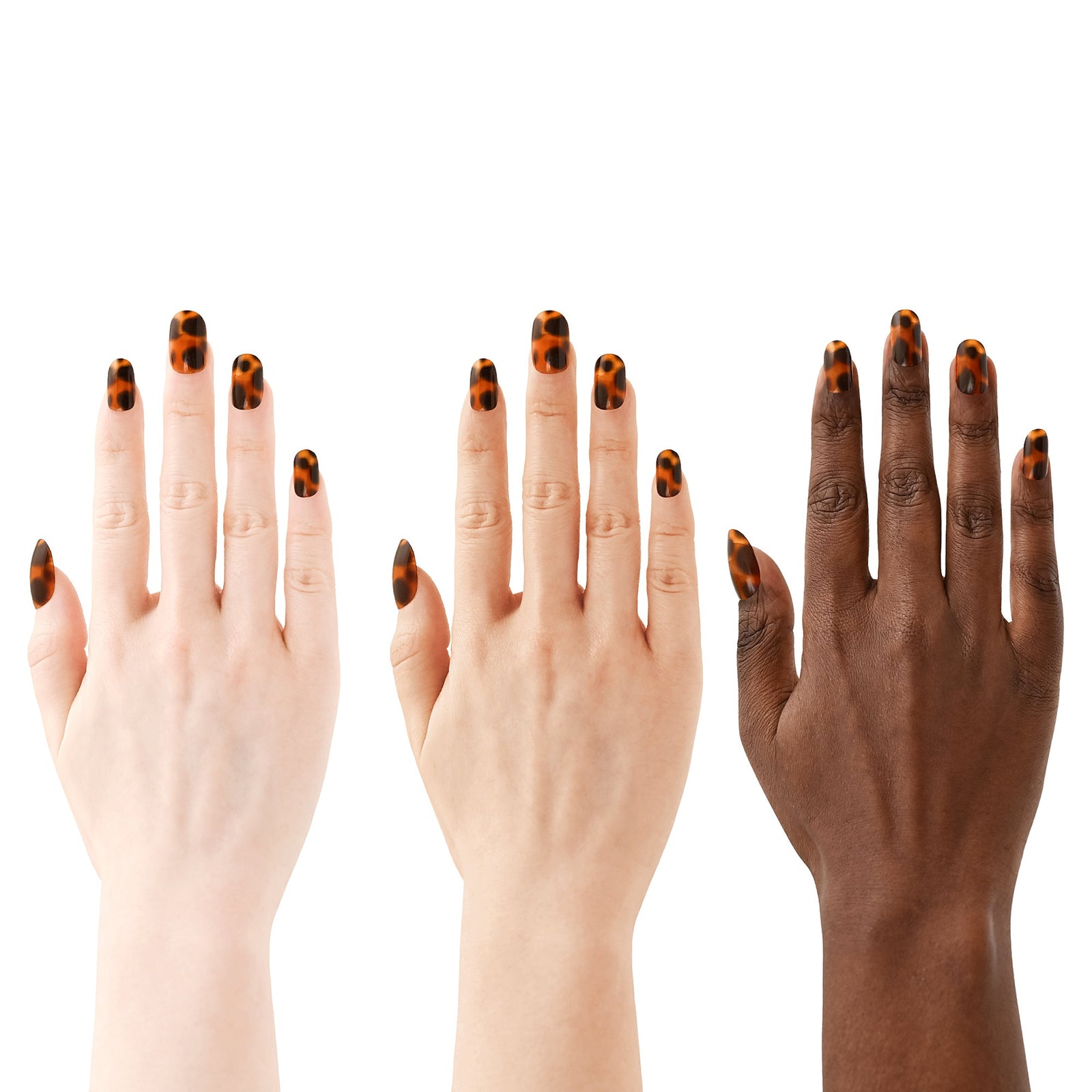 Three hands with black and orange nail designs on a white background